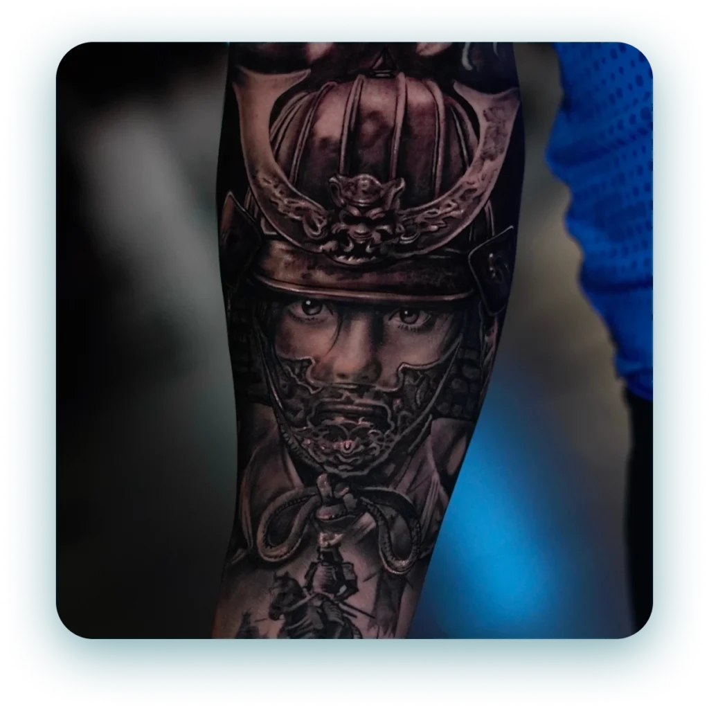 black-and-grey-samurai-realism-arm-tattoo
