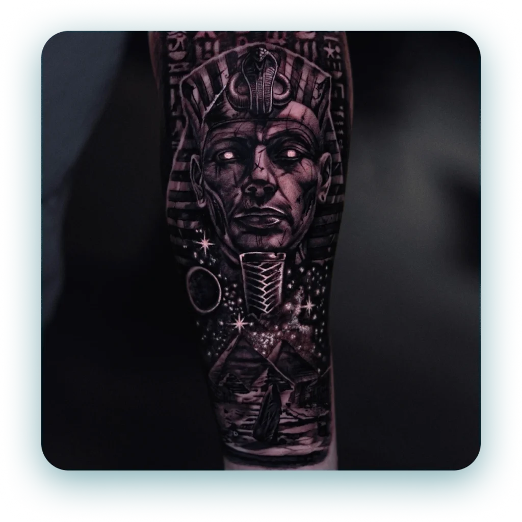 realistic-egyption-tomb-pharoah-arm-tattoo-black-and-grey